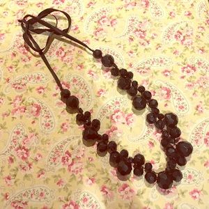 Long black ribbon bead necklace